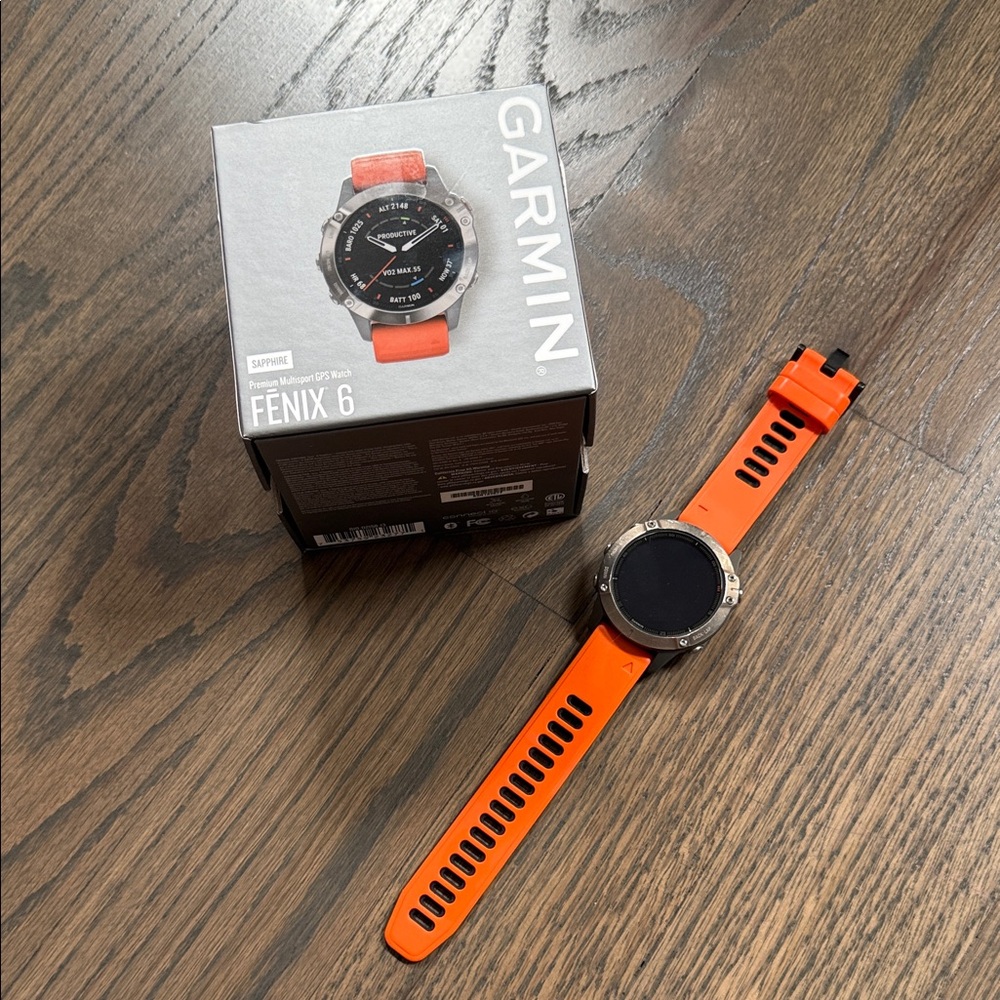garmin Fenix 6 Smartwatch with Bright Orange Silicone Band